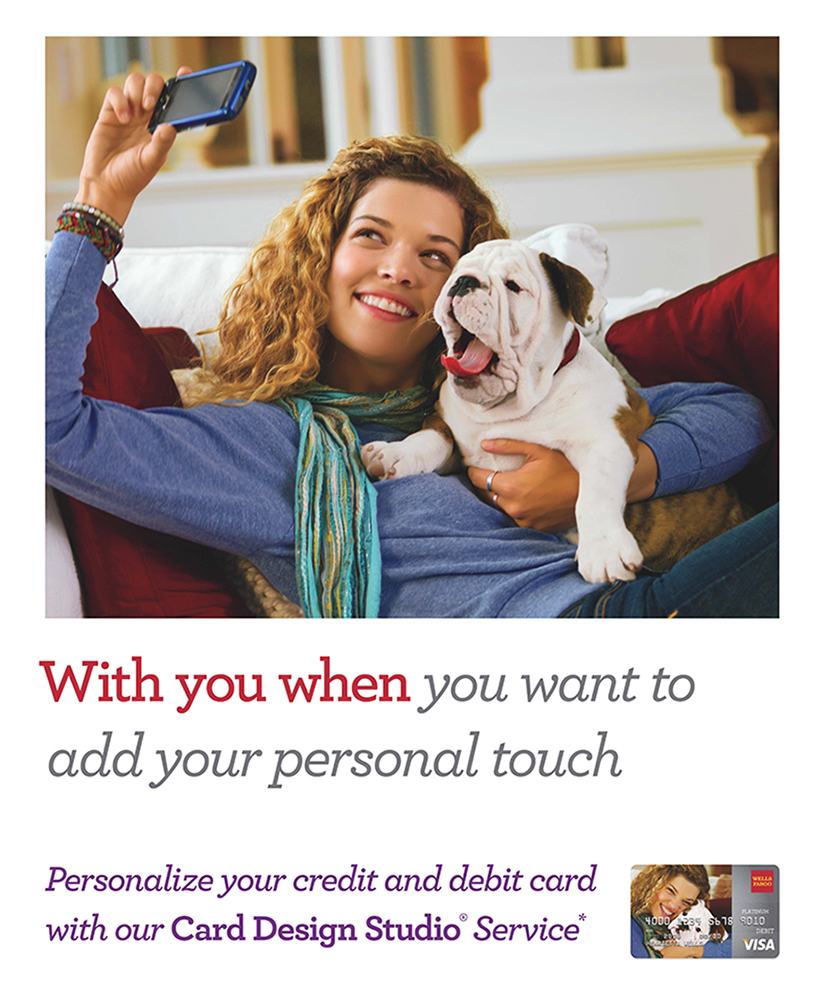 Advertisement showing woman sitting on couch taking selfie photo with her yawning bulldog. Reads With you when you want to add your personal touch. Personalize your credit and debit card with our card design studio service.