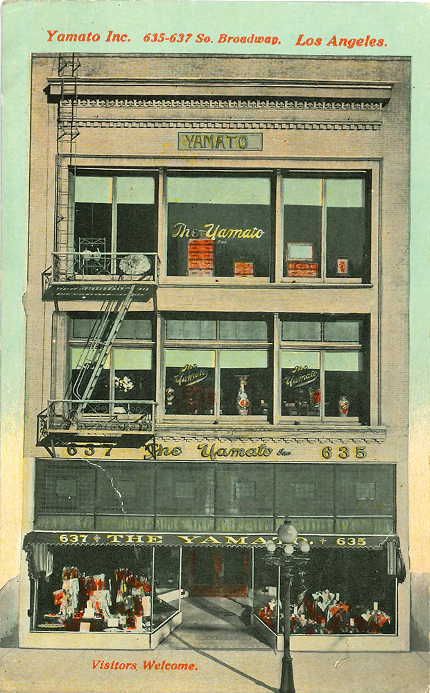Color postcard shows 3-story commercial building with street-level display windows, merchandise in windows. Legend reads Yamato Inc, South Broadway, Los Angeles. Visitors welcome. Postcard bold colors and graphics, vertical orientation.