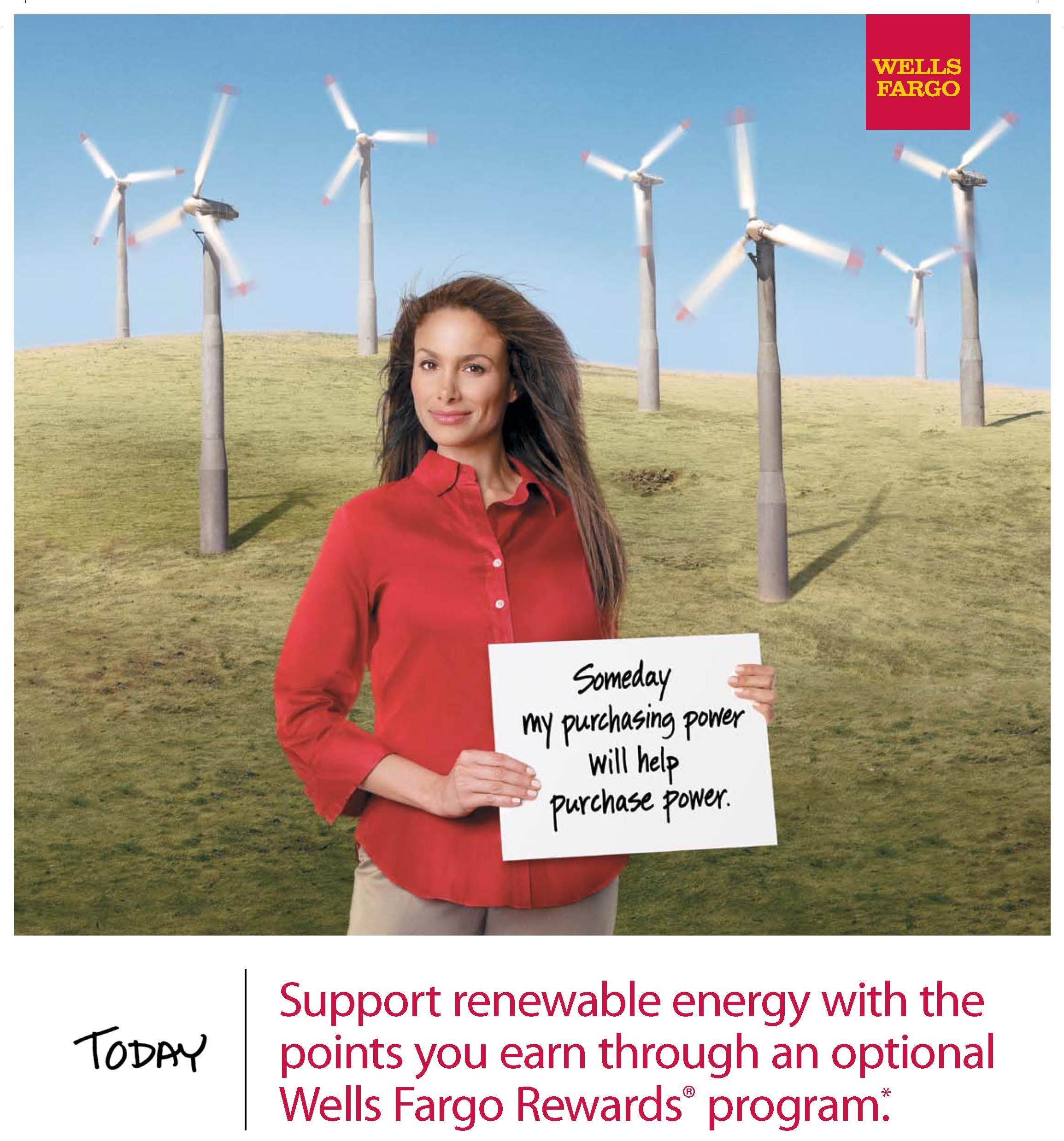 Ad with woman standing in field of windmills holding placard reading Someday my purchasing power will help purchase power. Ad copy below reads Today Support renewable energy with the points you earn through an optional Wells Fargo Rewards program. Image is color.