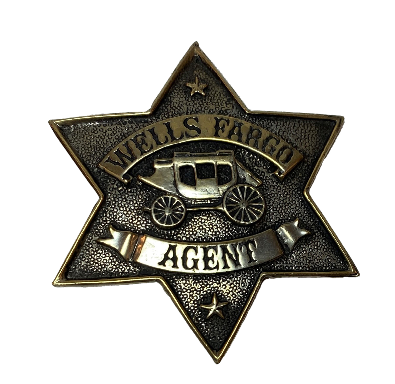 Image of metal six-pointed star badge reading Wells Fargo agent with profile engraving of stagecoach, center.