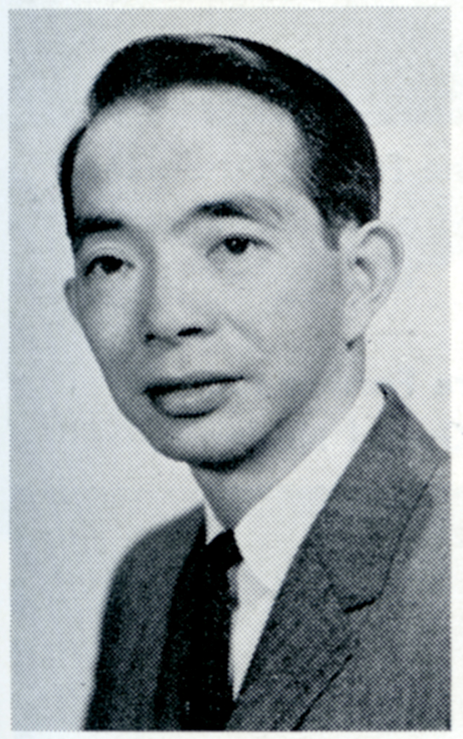 Black and white photograph of a man in a suit and tie. Image link will enlarge image.