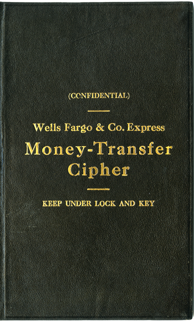 A leather-bound book with gold-foiled lettering reads: Confidential. Wells Fargo and Co. Express Money Transfer Cipher. Keep Under Lock and Key.