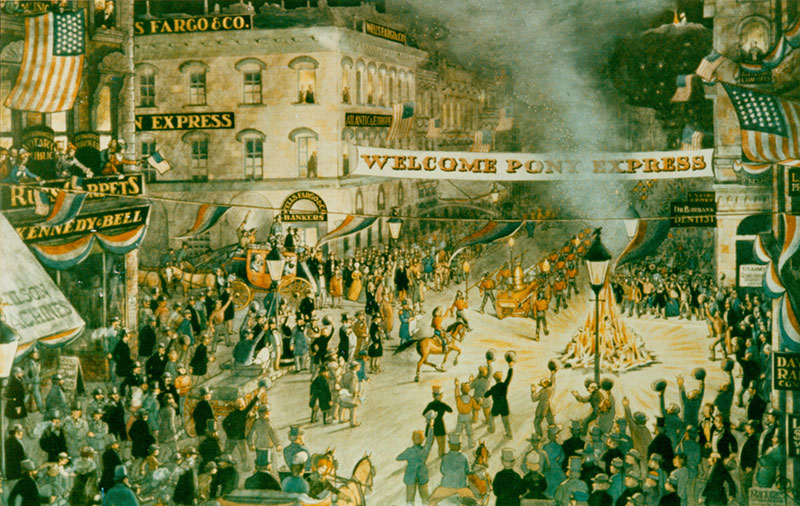 An illustration of the community of San Francisco gathered to await the arrival of the Pony Express rider. A large bon fire is lit in the center of the street beneath a banner that reads: Welcome Pony Express.