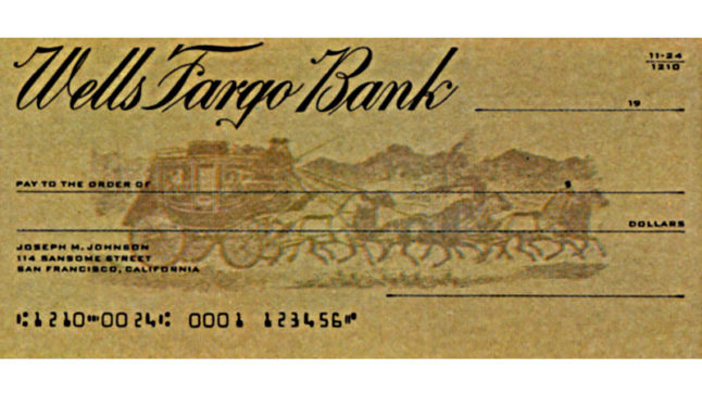 A brown check with black lettering. A dark brown stagecoach and horses silhouette runs across the Pay to the order of line.