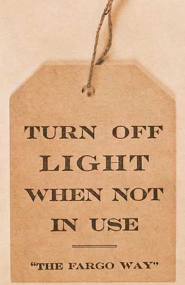 Hanging tag with text “Turn off light when not in use. The Fargo Way.”